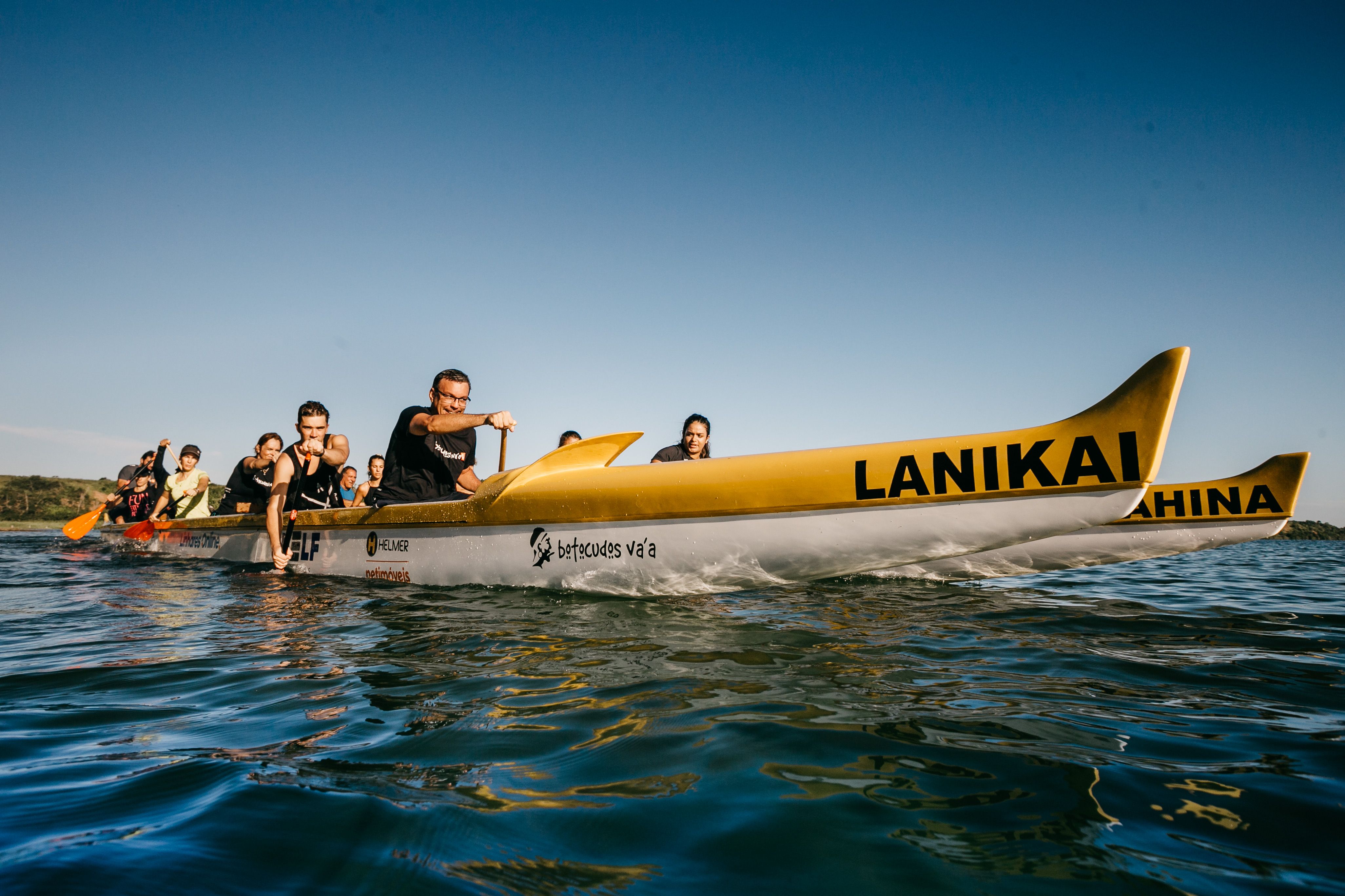 Outrigger canoe racing on open ocean